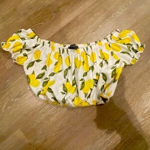 Womens XS cropped lemon top with ruffle sleeves, off the shoulder style.